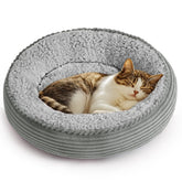 Love's cabin round donut bed front view offers a cozy escape for small pets.