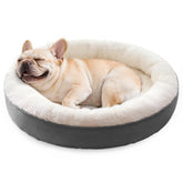 Love's cabin round donut bed with nest walls offers warm security for calm naps.