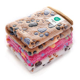 Luciphia paw-print brown pet blanket provides cozy sofa protection and pet comfort.