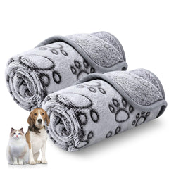 Luciphia paw-print blanket close-up, showcasing fluffy fleece for cozy pets.