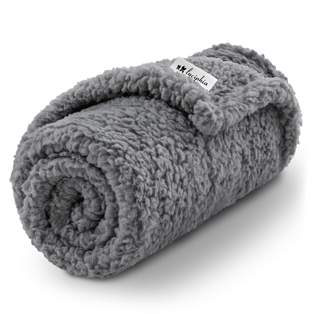 Luciphia premium fleece dog blanket grey 30x20 provides cozy warmth for small dogs.