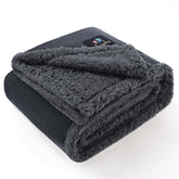 Luciphia waterproof bed blanket folded in grey protects furniture from spills.