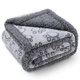 Luciphia waterproof pet blanket on a couch protects furniture while cozying your pet.