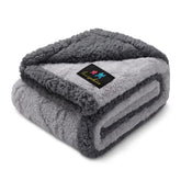 Luciphia waterproof pet blanket on sofa showing spill protection and durability