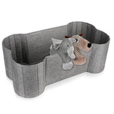 Lukeline bone-shaped dog toy basket, front view, keeps toys organized and accessible
