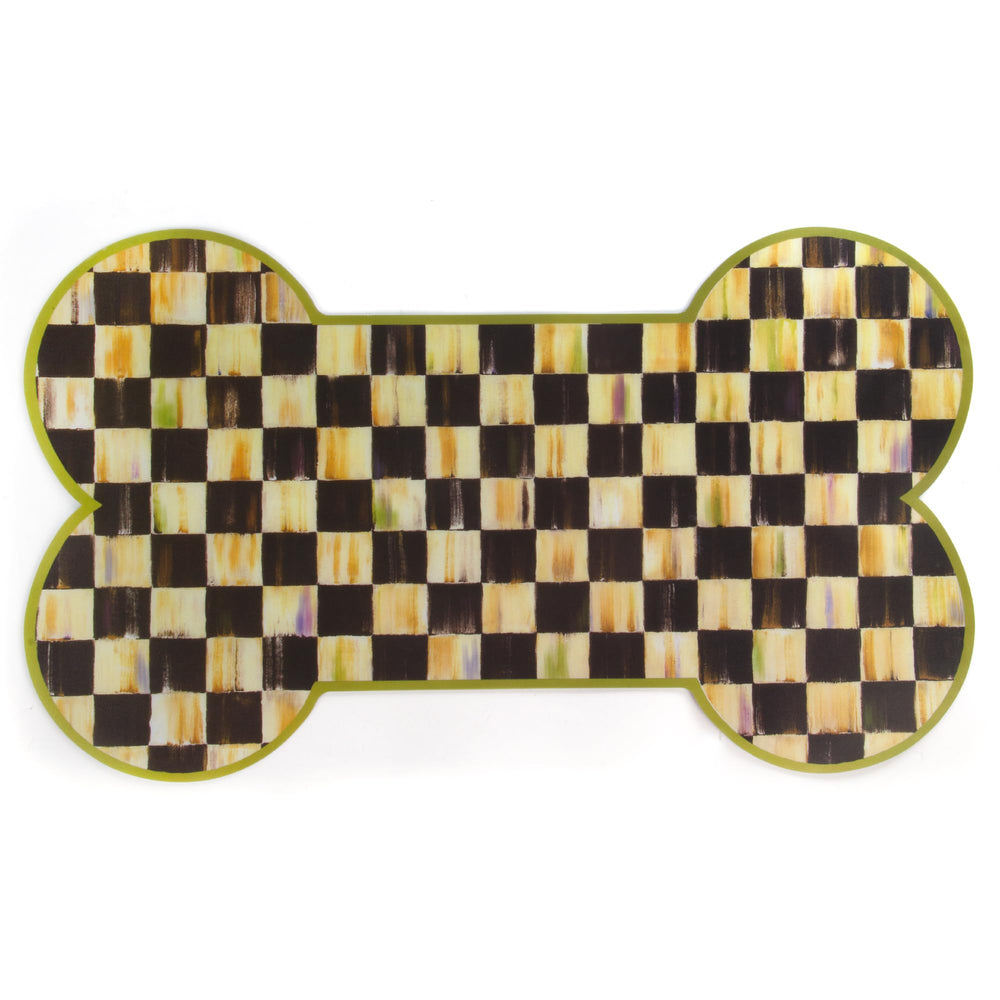 Mackenzie-Childs Pup Placemat bone-shaped mat keeps floors clean during meals and adds charm.