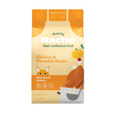 Made by Nacho dry cat kibble in a bowl showcases grain-friendly, high-protein formula.