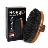 MAXIMILIAN World Class horse brush close-up showing craftsmanship and cleaning action.