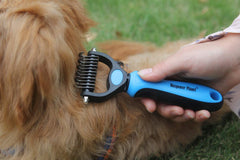 Maxpower Planet grooming brush with non-slip handle for comfortable, controlled brushing sessions.