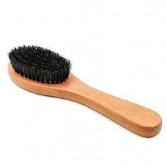 Menesia Pet Soft Brush in action on a cat for a soothing grooming session.