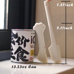 Meow&Woof mini spatula for canned pet food showing flexible silicone scraping.