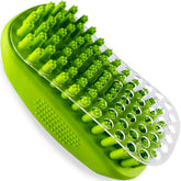 Metopets Rubber Curry Brush dog grooming close-up with soft bristles for gentle brushing.