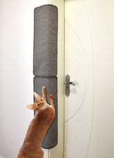MIAOGE sisal scratching mat installed on wall corner for space-saving cat play.