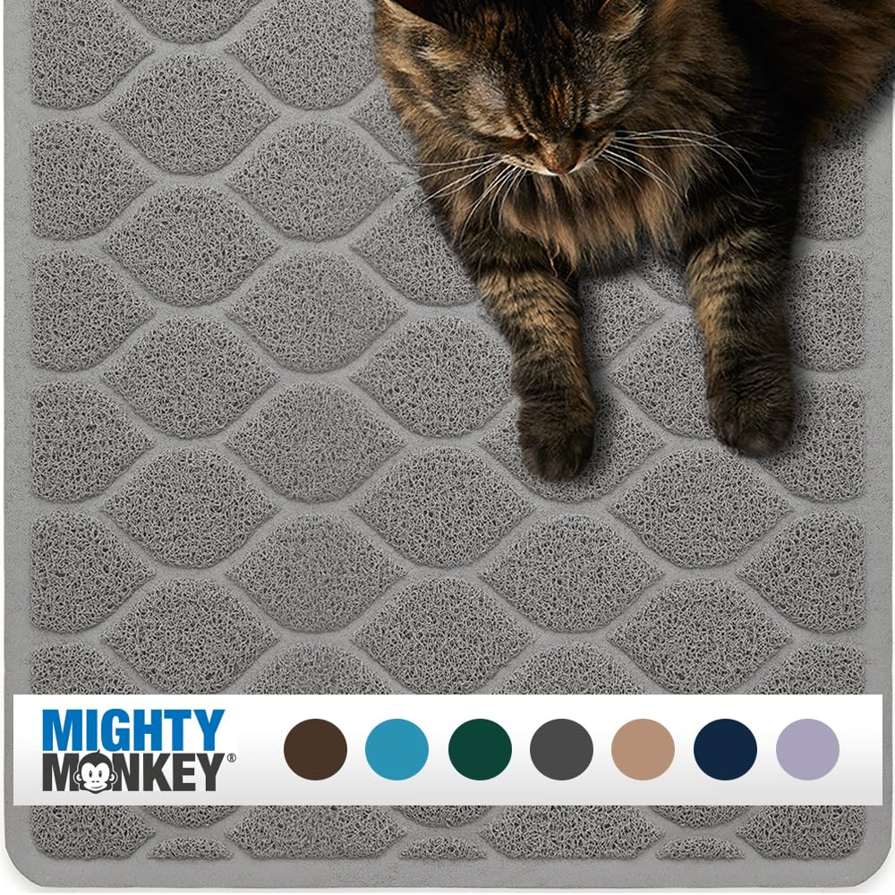 MIGHTY MONKEY waterproof litter mat under box traps litter and protects floors.