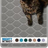 MIGHTY MONKEY waterproof litter mat under box traps litter and protects floors.