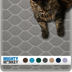 MIGHTY MONKEY waterproof litter mat under box traps litter and protects floors.