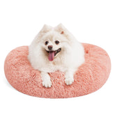 MIXJOY orthopedic donut bed pink 23in with plush fur for cozy sleep.