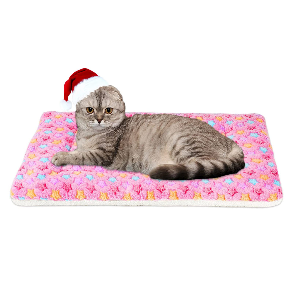 Mora Pets crate pad pink star print, top view showing cozy fleece for small pets.