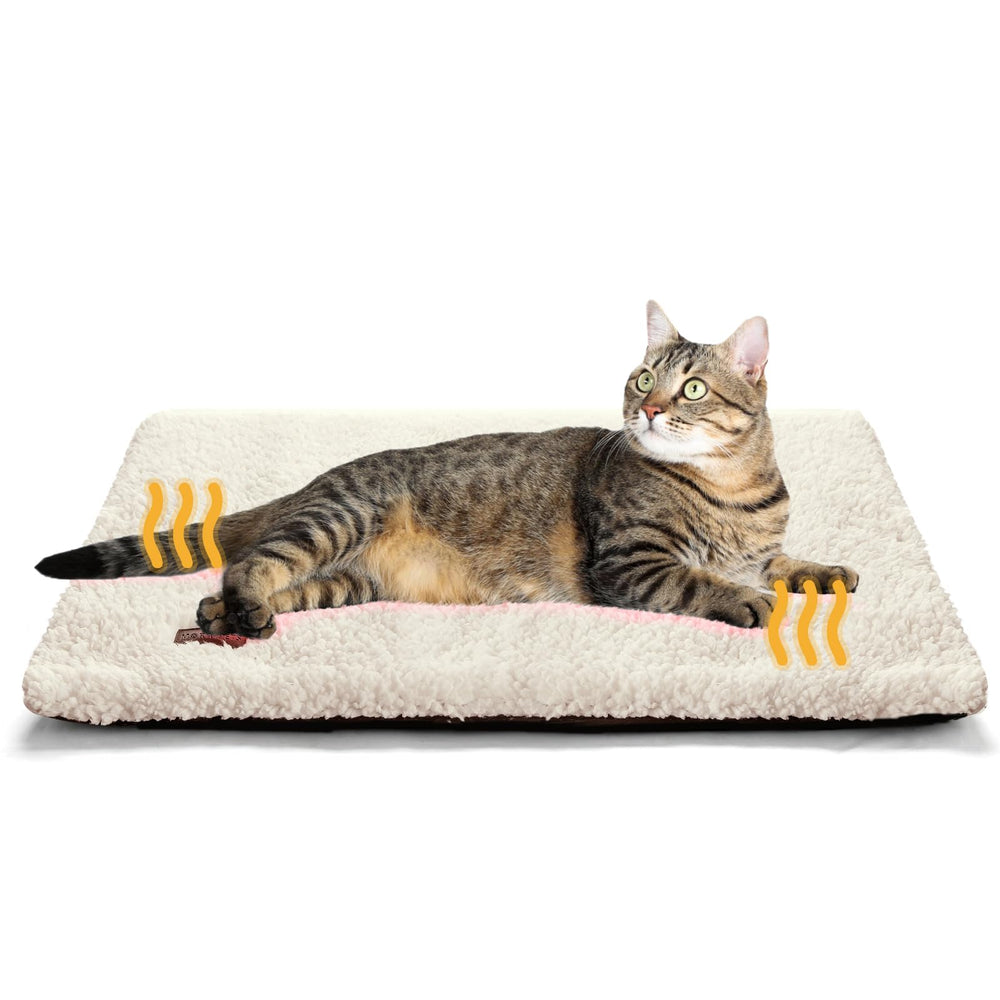 Mora Pets self-warming bed cover closeup highlighting carbon-infused warmth for cozy naps.