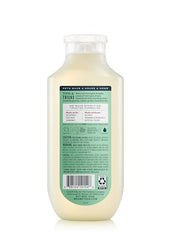 Mrs. Meyer's Clean Day dog shampoo pour bottle ready to lather and deodorize.