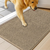 MUDGUARD MAT at doorway trapping mud and moisture to protect floors.