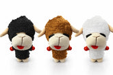 Multipet Lamb Chop Knobby Noggins black toy with squeaker for engaging fetch and chew sessions.