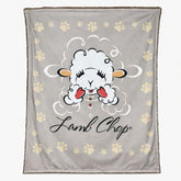 Multipet Lamb Chop Blanket rolled for easy storage and gifting