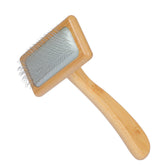 Muse&Iris dog and cat brush with bamboo handle delivers gentle grooming and shedding control.