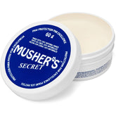 Musher's Secret bálsamo para patas de perro con barrera invisible.