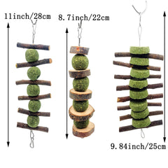 MYYZMY bunny chew toy apple stick hanging from cage demonstrates easy access and enrichment