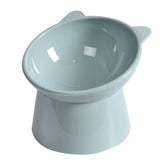 NABOKIO tilted cat food bowl blue – tilted design centers meals for spill-free feeding.
