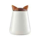 Nambe cat treat jar silhouette highlights playful design and convenient storage on countertops.
