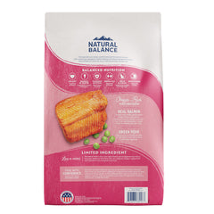 Natural Balance salmon-green-pea formula closeup shows grain-free kibble for sensitive digestion.