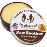 Natural Dog Company Paw Soother tin close-up showing rich balm for dry pads