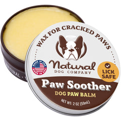 Natural Dog Company Paw Soother tin close-up showing rich balm for dry pads