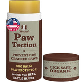 Natural Dog Company PawTection Balm stick applied to a paw for quick protection.