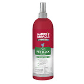 Nature's Miracle Advanced Platinum Dog Pet Block Spray bottle deters dogs from treated areas.