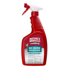 Nature's Miracle Advanced Platinum No More Marking bottle pour demonstrates easy spray application to deter marking