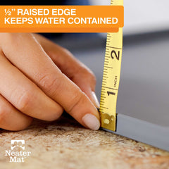 Neater Mat with raised edge keeps water contained during meals.