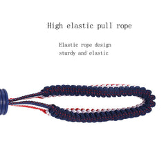 Nlmskzzy dog ball with rope toy close-up textured surface helps clean teeth.
