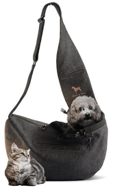 Noah & Paw dog sling carrier denim-strap provides secure support for small dogs during walks.