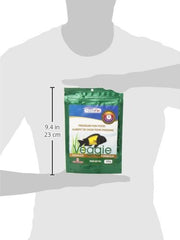 Northfin Veggie Fish Food slow-sinking pellets in tank context ideal for mid-water and bottom-feeders.