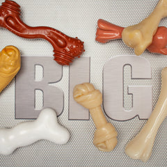 Nylabone Mega Knot Bone chicken flavor surface suggests long-lasting taste during chews.
