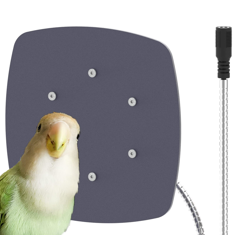 Ogioxam Bird Heater in cage providing cozy warmth for parakeets