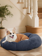 OhGeni 31in calming donut bed front view in blue supports joints with cozy warmth