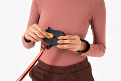 OllyDog Scoop Pick Up water-resistant fabric protects contents in rain