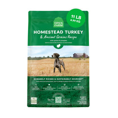 Open Farm ancient grains dry dog food bag shows protein-rich formulation for healthy muscles.