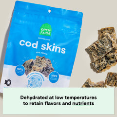 Open Farm US-made dog treats pouch shown with resealable packaging for freshness.