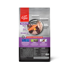 ORIJEN kitten dry food ingredients closeup shows fresh and raw components supporting nourishment.