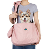 Ownpets sling carrier pink outdoor fit for hands-free pet transport during walks.